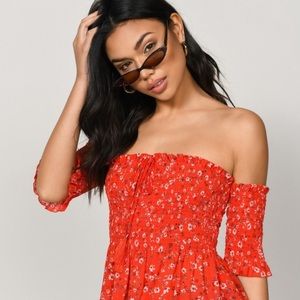 Red smocked off the shoulder peplum top